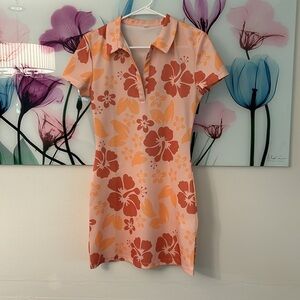 Mini creamsicle colored orange dress with multi orange colored flowers !